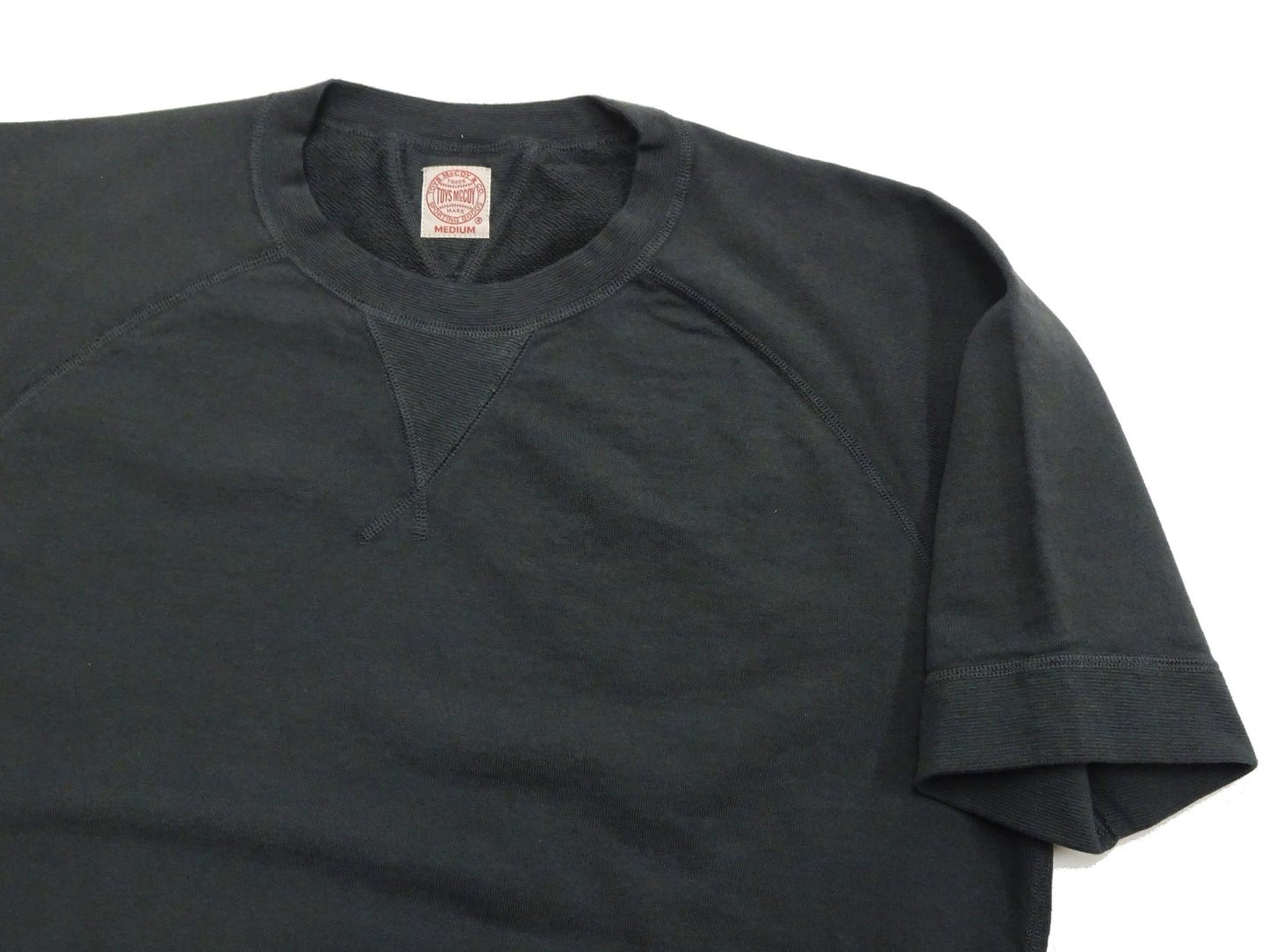 TOYS McCOY Men's Short Sleeve Raglan Sweatshirt, Garment-Dyed Loopback French Terry, V-Gusset Crewneck, Made in Japan (TMC2612 030 Garment-Dyed Washed Black)